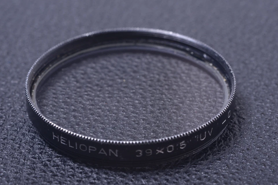 ✅ HELIOPAN UV -0 39MM 39X0.5 FILTER GENUINE LENS OR CAMERA SCREW IN 15-4 - Image 1 of 2
