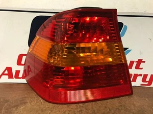 2003 BMW 325 LEFT/DRIVER TAIL LIGHT #60 OEM - Picture 1 of 4