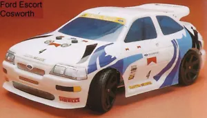 Carrozzeria body RC scale 1/8 Ford Escort Coswort +DECALS + Alettone RALLY 1 mm - Foto 1 di 2