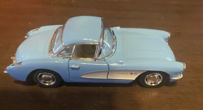 Литой под давлением 1957 Chevrolet Corvette автомобиля - синий - масштаб 1:34 - только один - DCCOR - Изображение 1 из 2