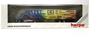 Herpa 1/87 187800 Scania Hauber semirremolque maleta Tamya Panasonic... EMBALAJE ORIGINAL (vía H - Imagen 1 de 1