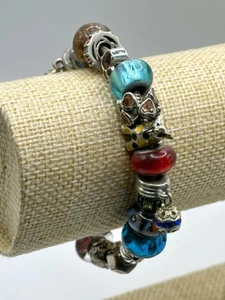 Bracelet Chamilia en argent sterling avec 10 breloques en argent sterling et 12 breloques non étoiles 8" - Photo 1/22