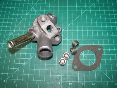 AIRTEX AO4235 Engine Coolant Water Outlet w Gasket & 4 Plugs fits Ford, Mercury  - Image 1 of 4