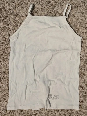 Camiseta sin mangas blanca para mujer Foto 1 de 2