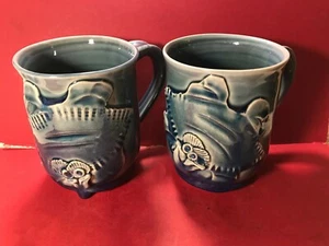 (2)  HAND THROWN WHIMSICAL MUGS-SIGNED- SMILING OCEAN RAY IN RAISED RELIEF - Picture 1 of 8