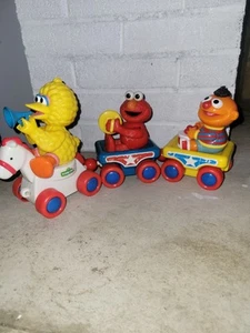 VTG ILLCO SESAME STREET TRAIN SET PULL TOY BIG BIRD ELMO ERNIE MUSIC BABY TOY - Picture 1 of 3