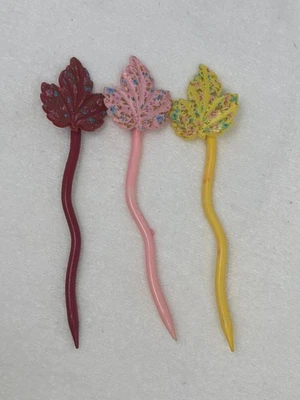 Juego de 2 horquillas coloridas para el cabello rosa amarillo rojo plástico Foto 1 de 4