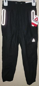 Reebok Transition Pant Color Black Size XS (4/5) Slim Zipper Pockets BRAND NEW - Picture 1 of 5