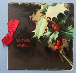 Tarjeta de felicitación Raphael Tuck Navidad acebo bayas cinta roja dorada vintage - Imagen 1 de 5