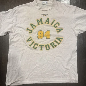 T-shirt Reebok vintage anni 90 Giamaica Victoria Giochi del Commonwealth punto singolo USA - Foto 1 di 6