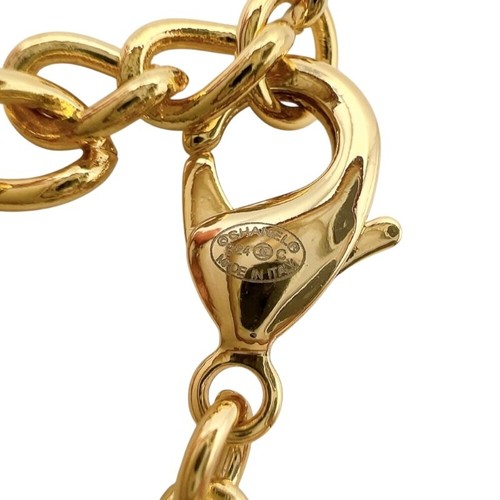 Collana CHANEL con ciondolo pattino a rotelle oro nero metallo pelle strass logo cocco