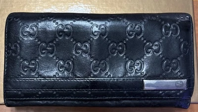 Cartera Gucci GG Continental en relieve en cuero negro Foto 1 de 4