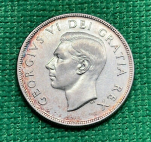 1950 Canada Silver Dollar.  Rim Toning.  Low Mintage of 261,000.