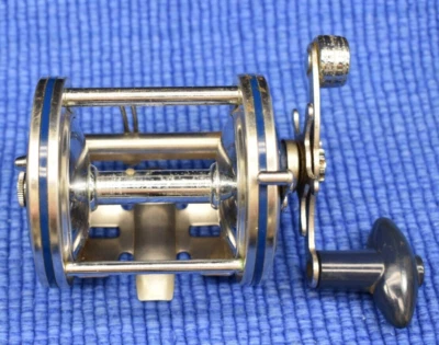 Carrete de fundición Olympic Dolphin 625-LW nivel viento agua salada cebo hecho en Japón Foto 1 de 4