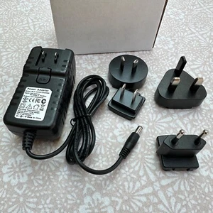 AC Adaptor Power Supply 12V 200mA UK Plug - plus Euro Adaptors - Picture 1 of 5
