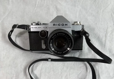 Lente automática Ricoh Singlex TLS 35 mm cámara SLR película Rikenon 50 mm f2 M42 nunca usada Foto 1 de 4