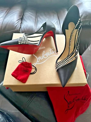 Christian Loboutin Foto 1 de 3