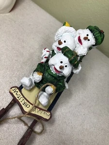 Muñeco de nieve explosivamente en un trineo de madera - Imagen 1 de 5