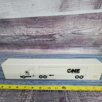 Remolque semirremolque de colección Ertl escala 1/64 Diecast AG ONE by White-New Idea negro Foto 1 de 4