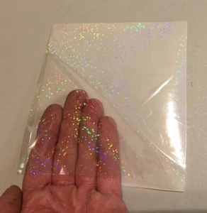 Paillettes scintillanti olografiche trasparenti SOVRAPPOSIZIONE, grado di laminazione, laminato largo - Foto 1 di 1