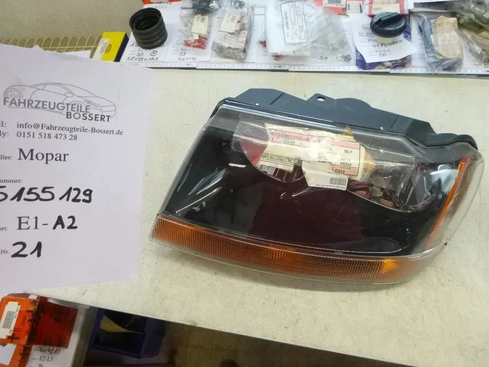 NEU Jeep Grand Cherokee 2 WJ WG Mopar Scheinwerfer links USA 55155129 05103401AA - Bild 1 von 1