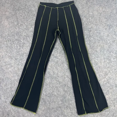 Pantalones acampanados negros The Ragged Priest costuras verdes talla pequeña elásticos Foto 1 de 4