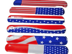 USA SLAP BRACELETS ( LOT OF 100 ) CARNIVAL, PARTY TOYS, FAVORS, EDUCATIONAL - Picture 1 of 4