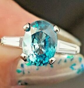 4.83TCW Gorgeous Bright Blue Zircon VS Baguette Diamond Platinum ring