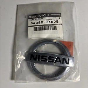 Nissan Emblem Rear Genuine Parts 84888-6A00B - Picture 1 of 5