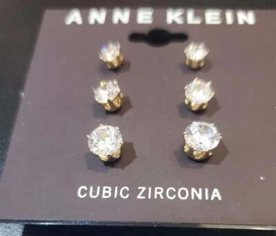 Juego de 3 aretes perforados de circonita cúbica Ann Klein en tono dorado  Foto 1 de 3
