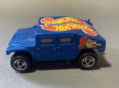 Humvee AM General Corp Hummer Metalflake Blue HW Race Team III Hot Wheels 1997 Foto 1 de 4