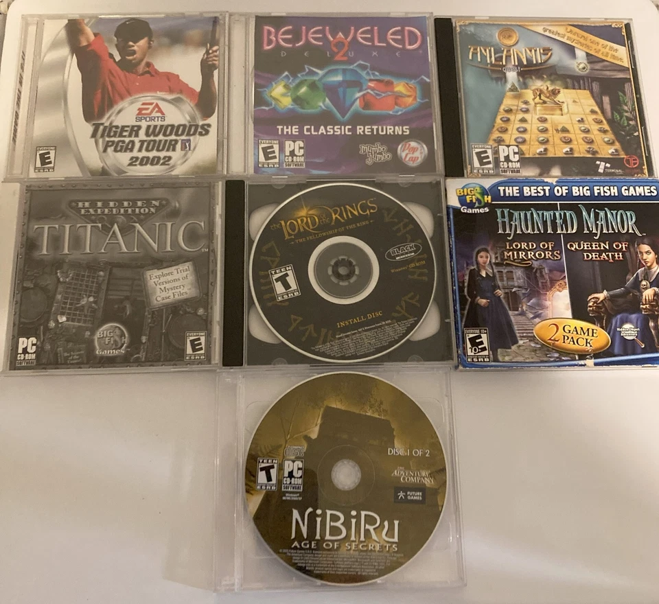 Lote de 7 juegos vintage CD-ROM PC Señor de los anillos-embrujado-joyas-titanic-etc Foto 1 de 1