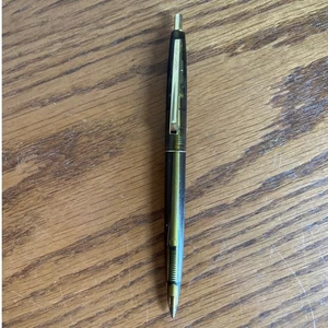 Bolígrafo vintage BIC CLIC gris humo transparente borde dorado México - Imagen 1 de 6