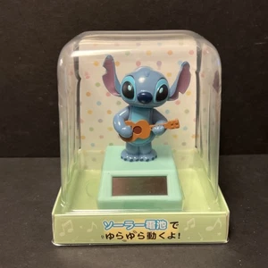 New Solar Powered Dancing Toy Bobblehead - Japan Disney Parks - STITCH Guitar - Picture 1 of 2