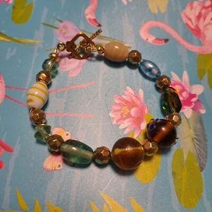 Handmade Strung Glass Bracelet Brown Green Blue Gold Tone Toggle - Picture 1 of 2