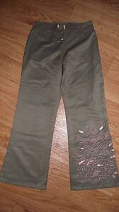 Girls Boutique Sara Sara pants size 8 green w/ pink flower embroidery & cut outs