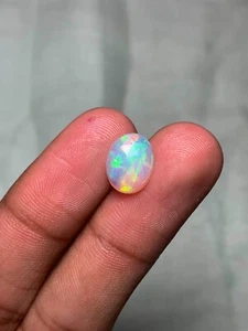 AAA Quality Ethiopian Fire Opal 1.30 CT Oval Shape Faceted Opal Loose Gemstone - Picture 1 of 3