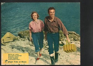 High Tide at Noon Lobby Card-Betta St. John on the coat with William Sylvester.