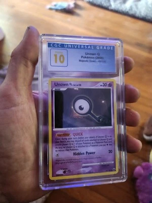 (POP 1) CGC 10 PRISTINE UNOWN Q 49/100 Majestic Dawn Pokemon Card 2008 - Image 1 of 4