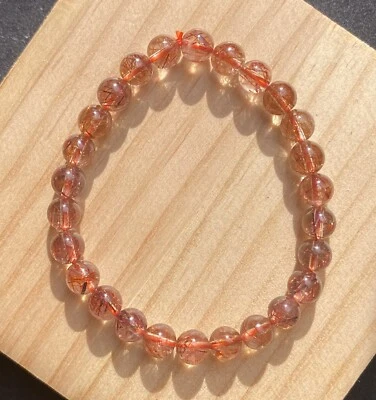 7.2mm Natural Copper Brown Rutilated Crystal Super Energetic Bracelet - Image 1 of 3