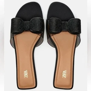 Neu mit Etikett Zara Sandalen mit verzierten Schleifen schwarz Strass - Bild 1 von 7
