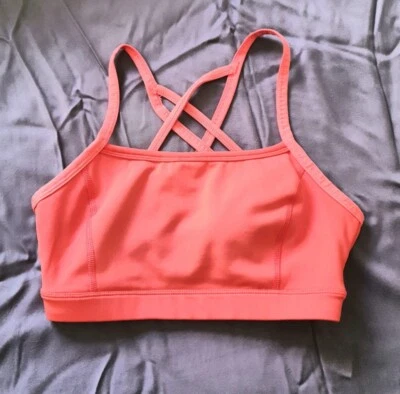 Sujetador deportivo con correa cruzada Athletic Works talla XS coral 0-2 Foto 1 de 4