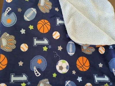 Manta deportiva azul circo para bebé sherpa fútbol béisbol baloncesto fútbol objetivo Foto 1 de 4