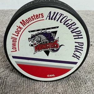 Lowell Lock Monsters AHL Defunct Team Official Hockey Puck Vintage - Picture 1 of 3