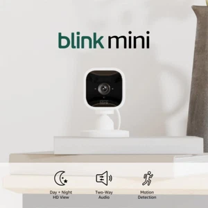Blink Mini - Compact Indoor Plug-In Smart Security Camera, 1080P HD Video, Night - Picture 1 of 12