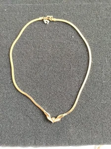 Collana girocollo Pierre Cardin tono oro scintillante - Foto 1 di 5