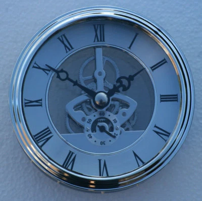 Skeleton Clock 97mm diameter quartz insertion, silver finish.  - Image 1 of 3