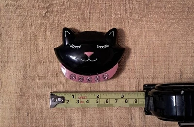 Compacto giratorio Cat Foto 1 de 3