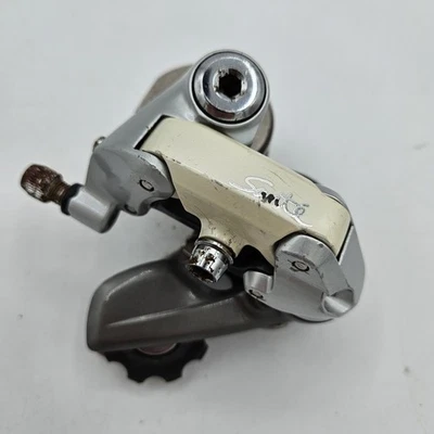 Desviador trasero Shimano Sante 7 velocidades, RD-5000, jaula corta, blanco/gris, carretera SIS Foto 1 de 4