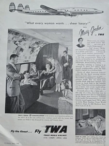 TWA Airlines Super Constellation 1955 azafata servir pasajeros anuncio de colección - Imagen 1 de 1
